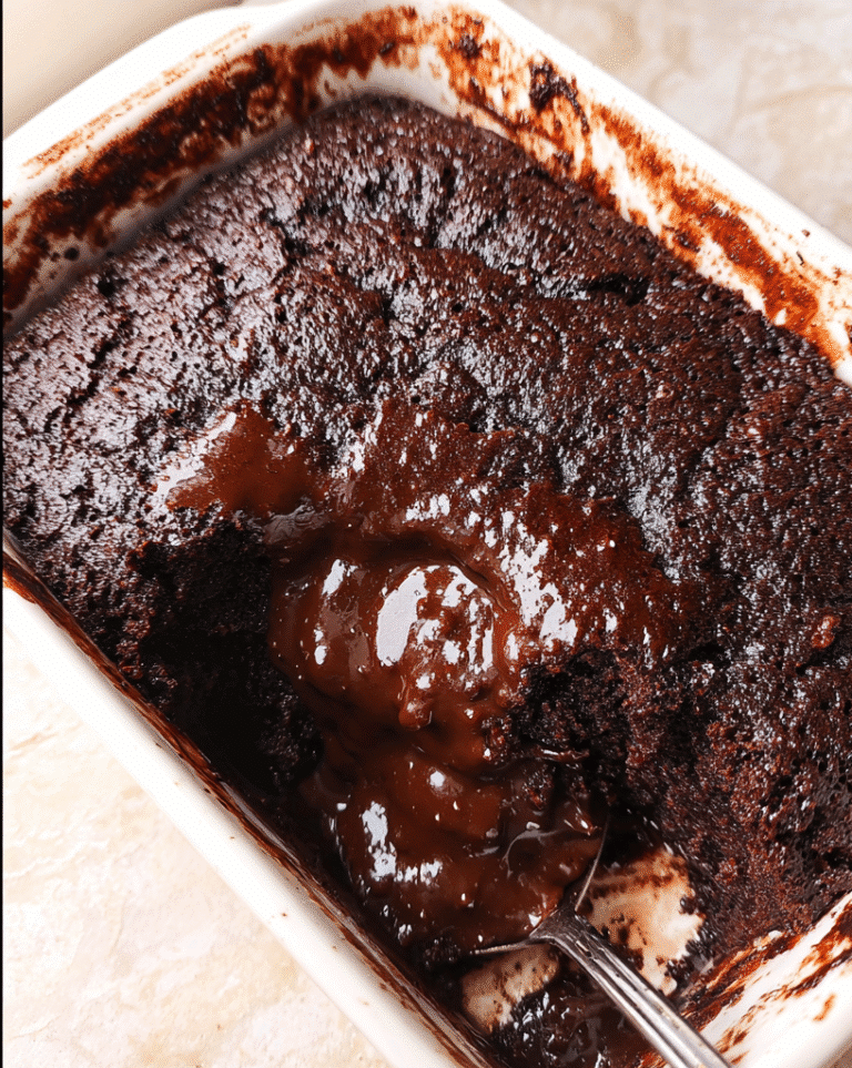 Microwave Chocolate Pudding Cake: The Ultimate Quick & Gooey Dessert Fix 9 Microwave chocolate pudding cake in a mug with gooey sauce